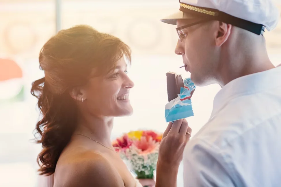 Bride and groom smile at each other