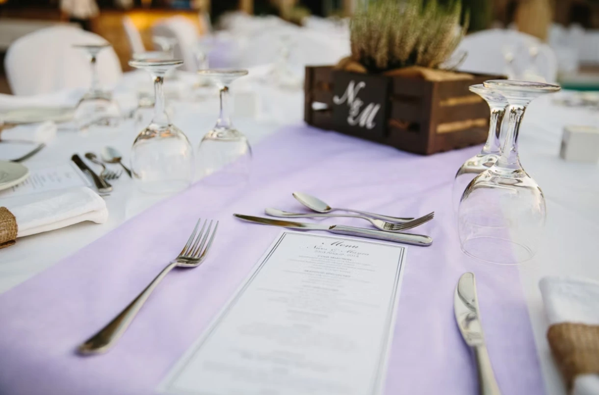 Placesetting at wedding with menu laid out on the table